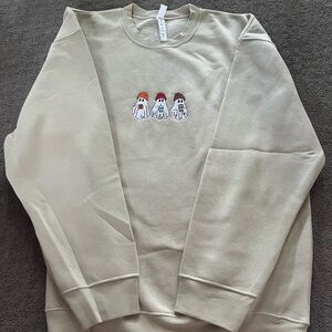 Beige Sweatshirt with Cartoon Graphic